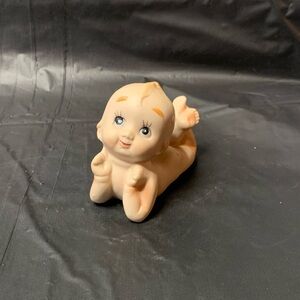 Kewpie Porcelain Baby Beige Vintage Laying on Tummy Big Eyes Collectable Cute